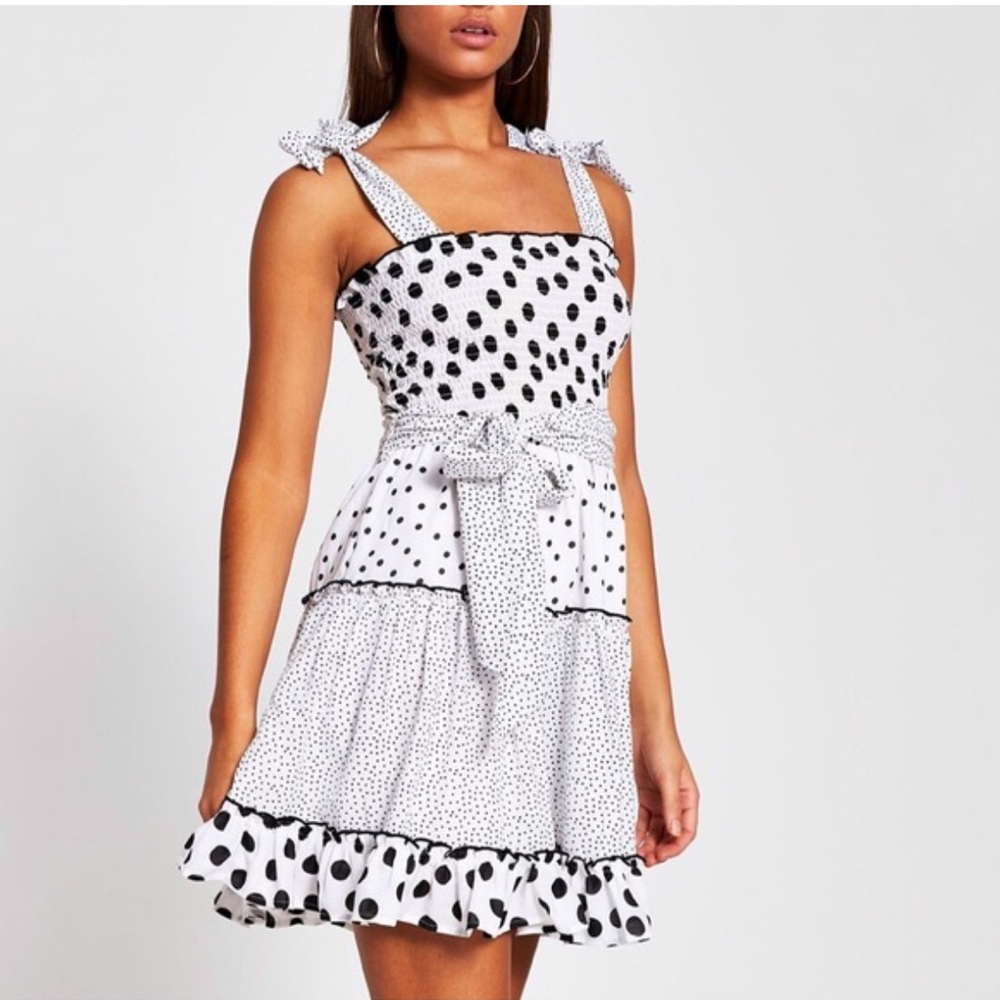 Elegant Black and White Polka Dot Mini Dress